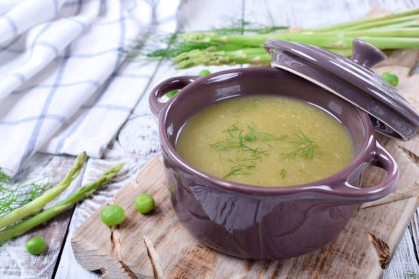 Vegetable pureed soup with asparagus and green peas