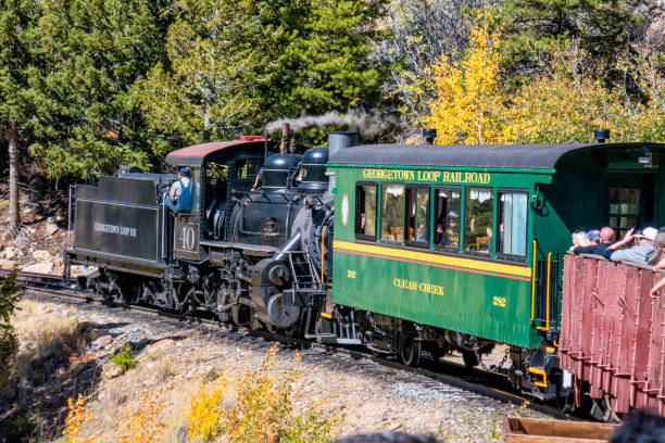 Train of Leadville, Colorado and Southern Tourist Line September 29, 2019 - View of the train of the Leadville, Colorado and Southern Railroad is a tourist railroad based in Leadville, Colorado against fall colors leadville stock pictures, royalty-free photos & images