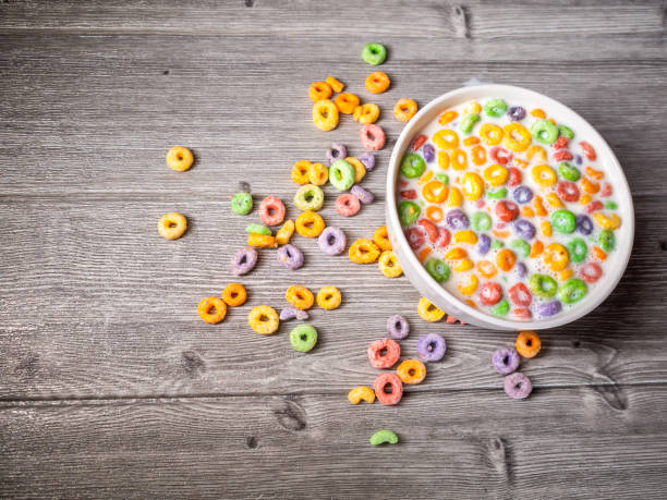istock many colorful sugary cereal grains on a blue background close-up 1256864574