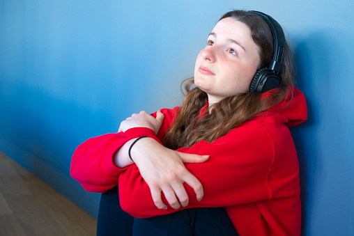 A teenager listening music