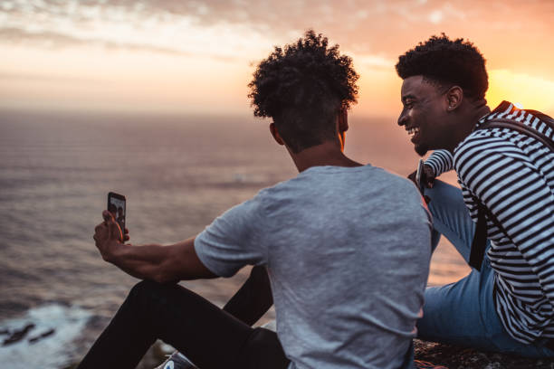 istock Two friends taking a selfie 1256870674