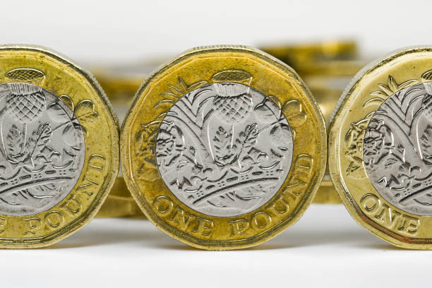 istock Close up of British one pound coins. 1256871824