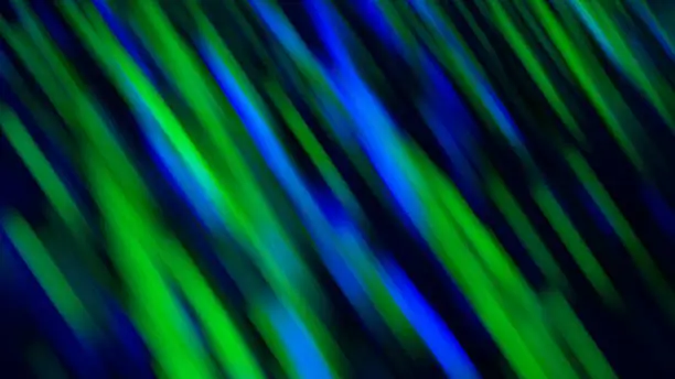 Photo of Neon Abstract Laser Beam Lights Speed Motion Pattern Blue Green Black Textured Background