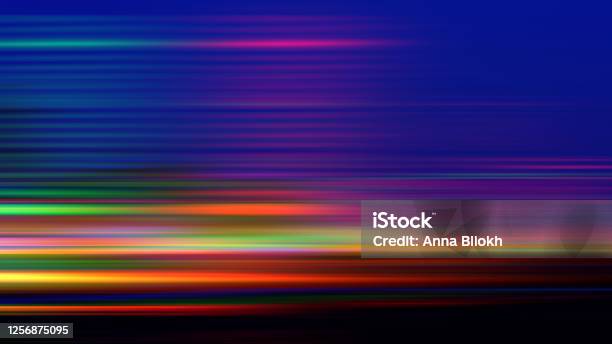 Abstract Speed Background Neon Colorful Gradient Dark Spectrum Igniting Motion Pattern Light Trail Orange Black Green Purple Navy Blue Color Vitality Blurred Bright Texture Long Exposure Stock Photo - Download Image Now