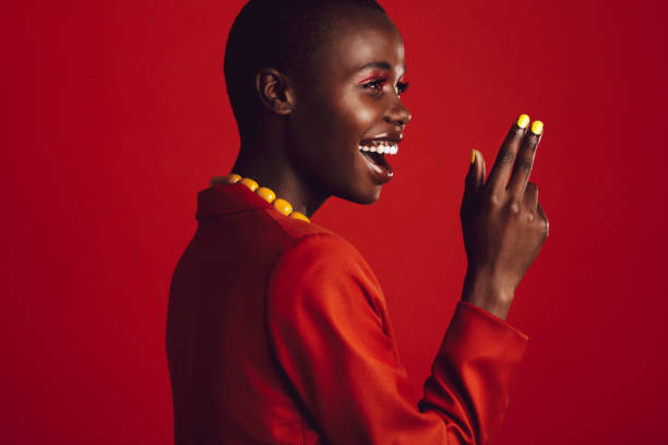 istock African female model with vibrant makeup 1256875970