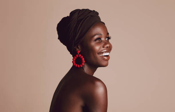 istock Smiling african woman with a turban 1256877032