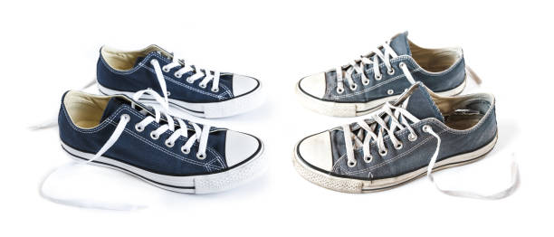 istock New and old blue sneakers isolated on white background 1256883531