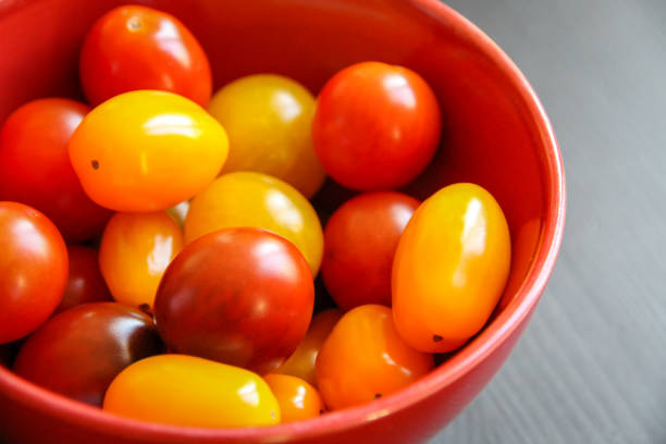 istock Cocktail tomatoes in a bowl 1256883650