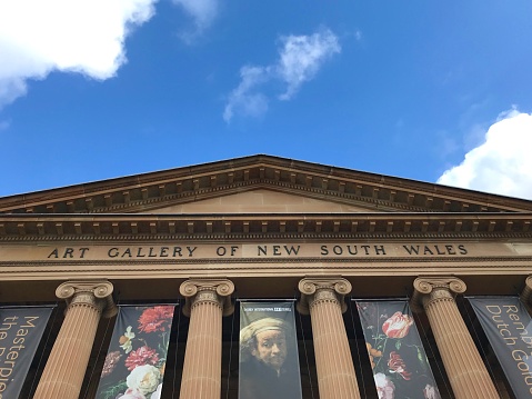 January 3, 2018 - Sydney, Australia: General front facade of Art Gallery of New South Wales, people walking inside in a blue sunny day.\n\nArt Gallery of New South Wales in Sydney in summer sunshine. The museum was established in 1880 and is considered to be the most important gallery in Sydney and the fourth largest in Australia. It displays Australian, European, and Asian artwork.