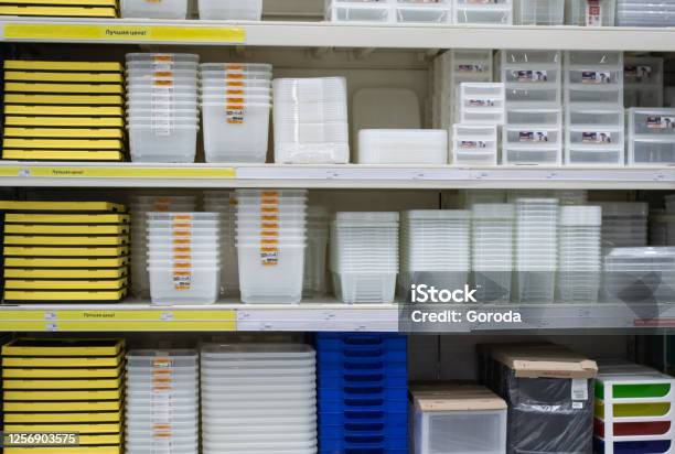 Stacked Of Transparent White Blue And Yellow Plastic Boxes For Storage Inside The Warehouse In Store Stock Photo - Download Image Now