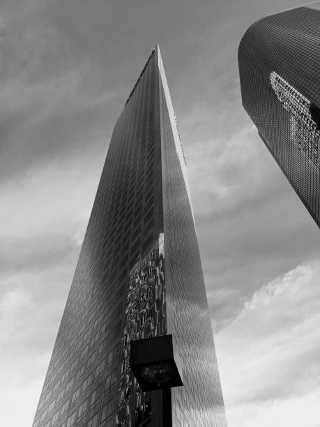istock Downtown skyscrapers, Clouds, B&W Jagged and Curved bldgs 1256904734