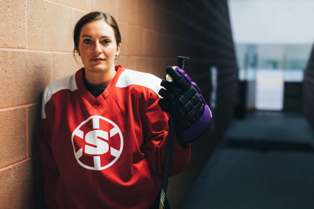 istock Women's Ice Hockey Offense Player Portrait 1256904823