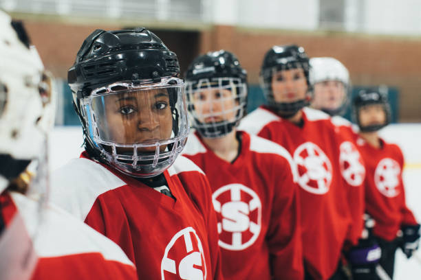 istock Women's Ice Hockey Team on Ice 1256904841