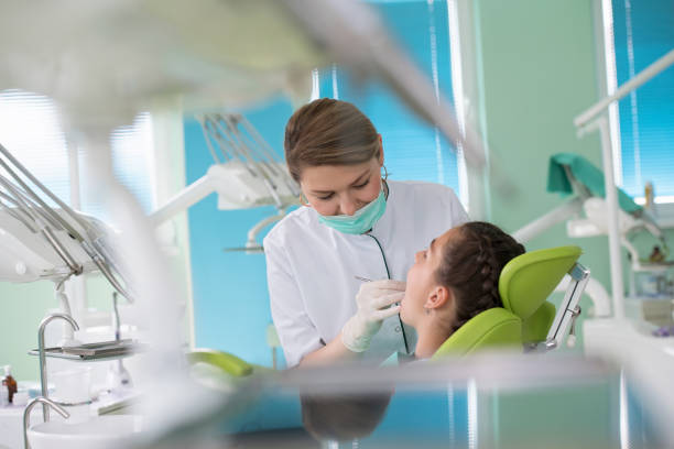 istock Dentist and patient in dentist office 1256906004