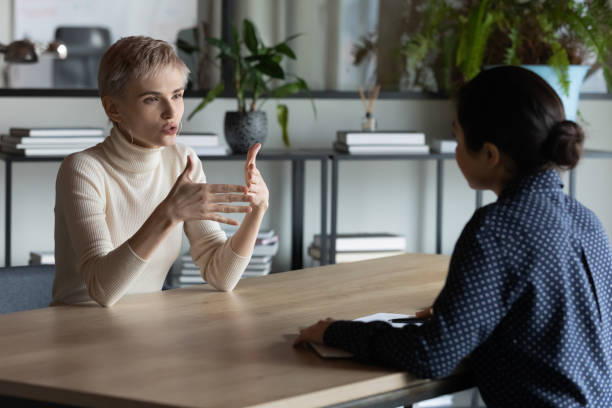 istock Company representative make offer to client convince buy services concept 1256907190