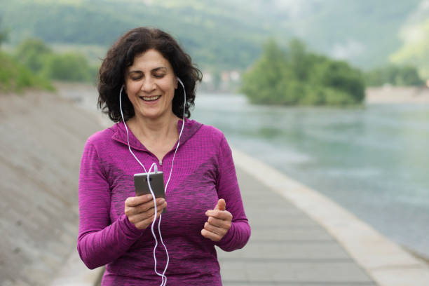 istock Active senior woman is on a video call 1256909685