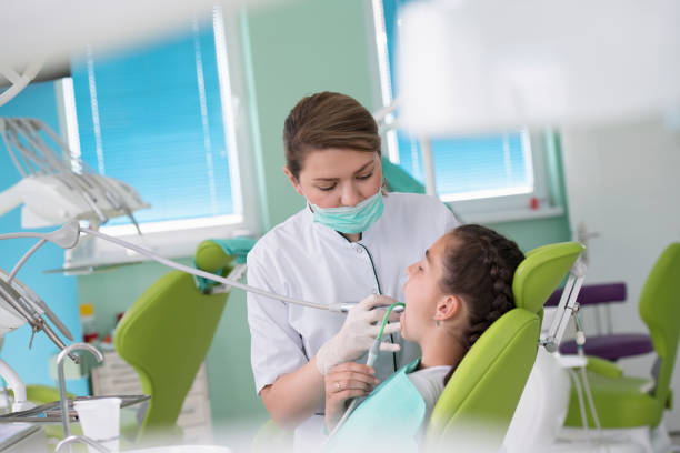 istock Dentist and patient in dentist office 1256913043