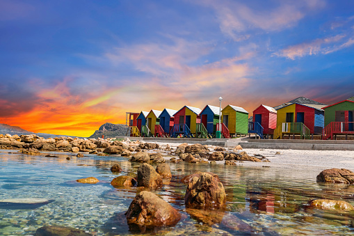 Muizenberg beach huts wooden cabins at twilight in Cape Town South Africa