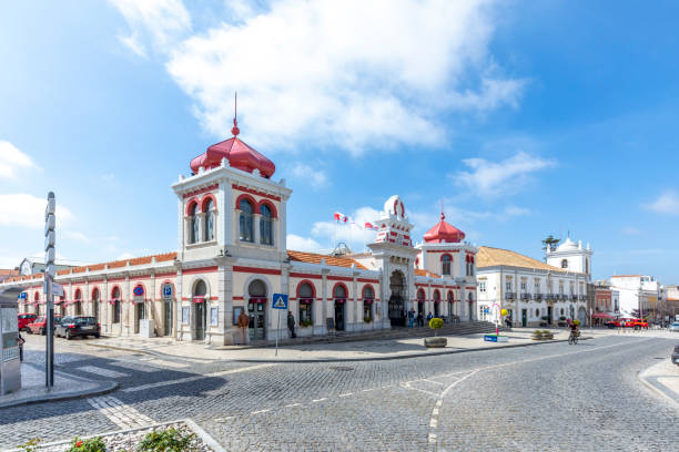 Moorish architectural facade of the traditional market consisting of family run stalls selling local grown or sourced produce which include fish, fabrics and gifts stock photo