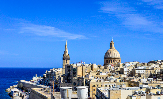 Valletta, Malta, Feb 27, 2020. Beautiful Malta Valletta city skyline in front of sea in a sunny day.