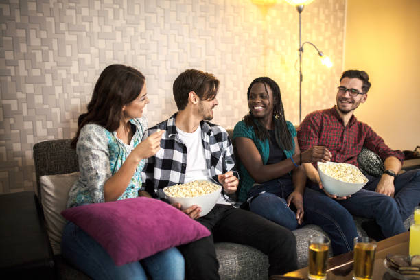istock Watching footbal on tv 1256923458