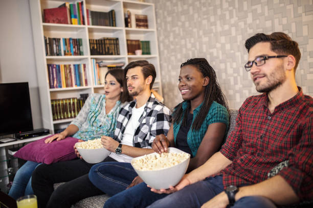 istock Watching footbal on tv 1256923880