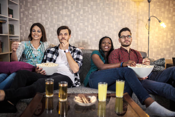istock Watching footbal on tv 1256924415