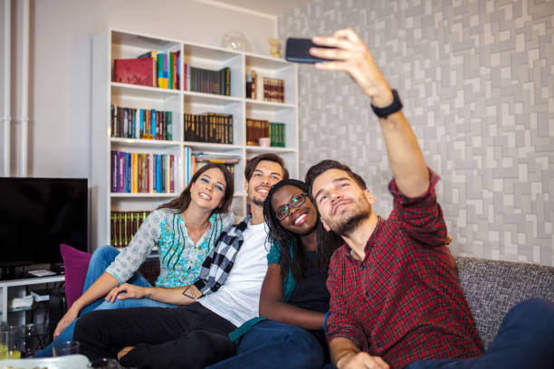 istock Friends making selfie with a smart phone 1256927839
