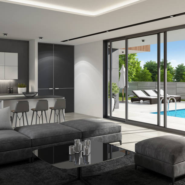 istock Luxurious villa interior with swimming pool at summer daylight scene 1256932533