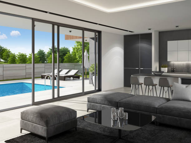 istock Luxurious villa interior with swimming pool at summer daylight scene 1256932542