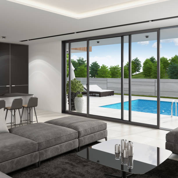 istock Luxurious villa interior with swimming pool at summer daylight scene 1256932647