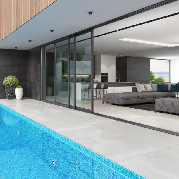 istock Luxurious villa interior with swimming pool at summer daylight scene 1256932718