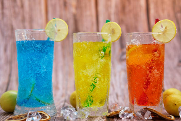 istock Various refreshments cocktail with lime juice and summer drinks on wood table 1256933965
