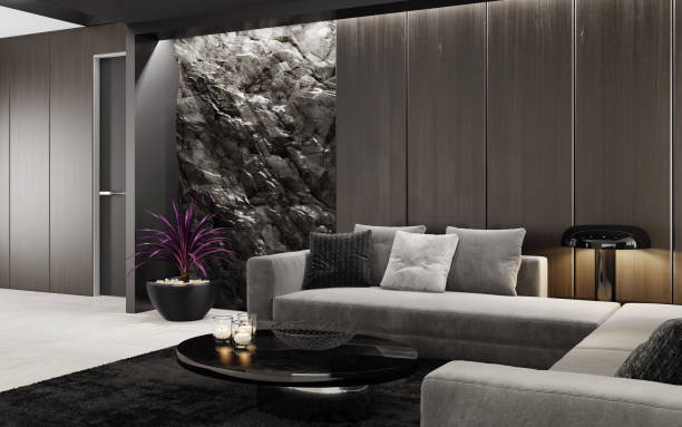 istock Mountain rock stone wall in luxurious lounge room interior 1256933985
