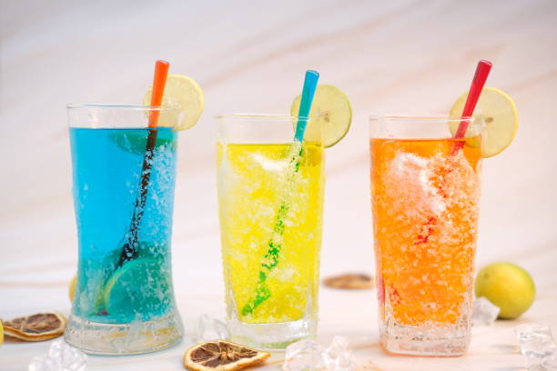istock Alcoholic cocktail and non alcoholic cocktail on table. Summer cold drinks with lime 1256934013