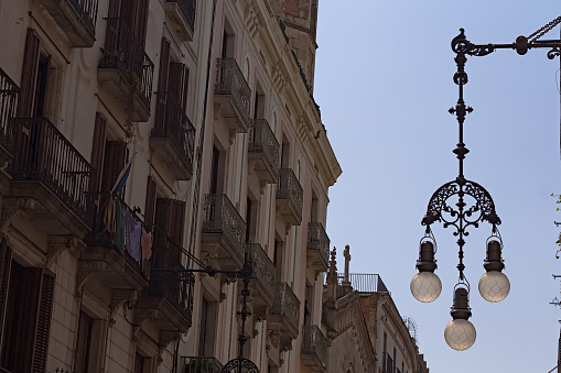 Low angle view of beautiful street lanterns around gothic quarter in Barcelona Spain