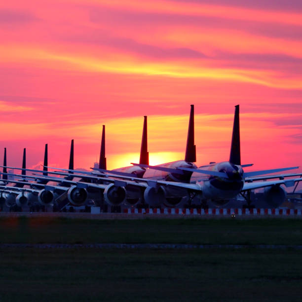 istock airplanes at airport apron with beautiful sky background 1256934761