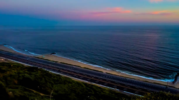 pacific palisades beach, los angeles california sunset during lockdown - horizon over water malibu california usa imagens e fotografias de stock