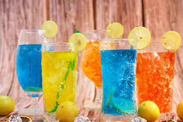istock Various refreshments cocktail with lime juice and summer drinks on wood table 1256935676