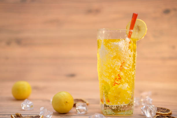 istock Orange cocktail on the table background 1256936975