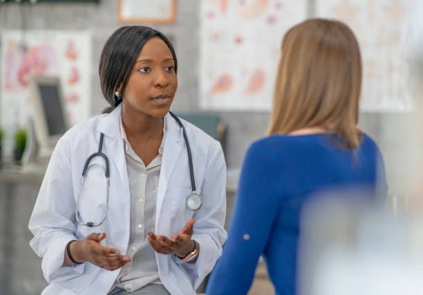istock Woman has medical appointment 1256944442