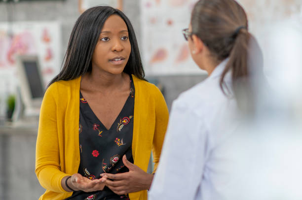 istock Woman has medical appointment 1256944449