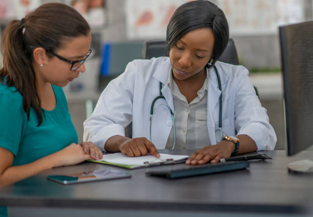 istock Woman has medical appointment 1256944457