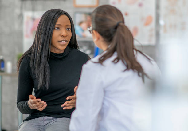 istock Woman has medical appointment 1256944459