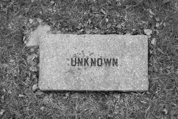 Granite headstone in an old historic cemetery. The word \
