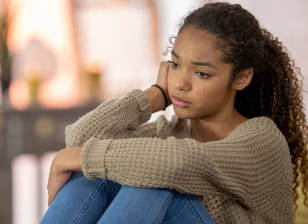 istock Teenage girl struggles with depression 1256947068