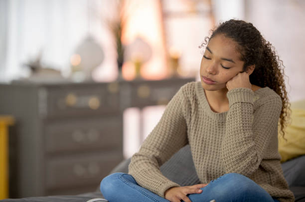istock Teenage girl struggles with depression 1256947072