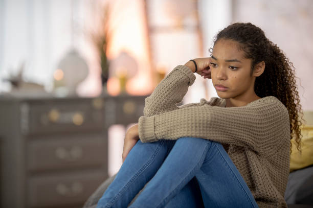 istock Teenage girl struggles with depression 1256947078