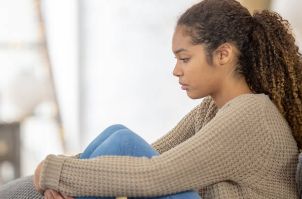 istock Teenage girl struggles with depression 1256947079