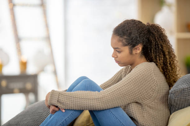 istock Teenage girl struggles with depression 1256947082